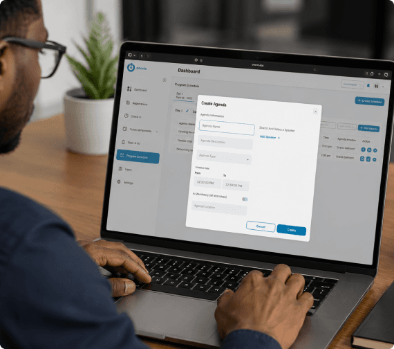 Event organizer creating an agenda on a laptop