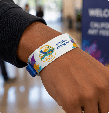 General admission wrist badge worn at an event
